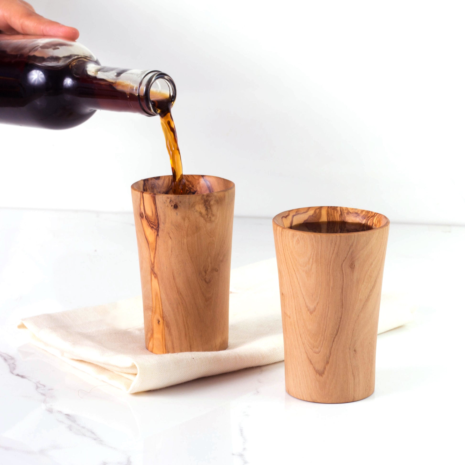 Olive Wood Cup for Warm and cold Beverages: Savor the natural insulation properties of olive wood with this cup, keeping your coffee or tea warm. Its unique grain patterns ensure every piece is exceptional.