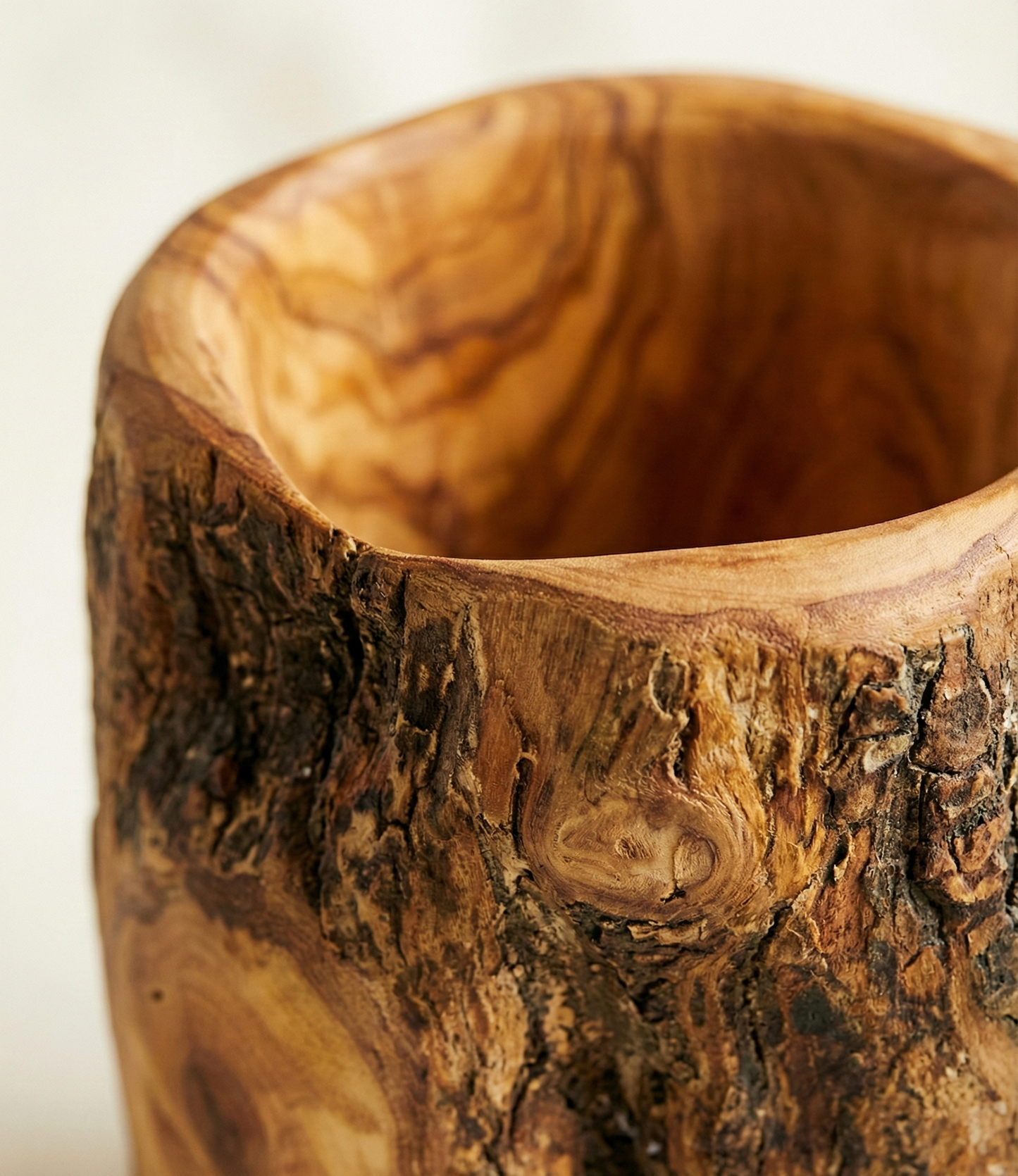 Olive wood utensil set with tree trunk holder and four cooking spoons