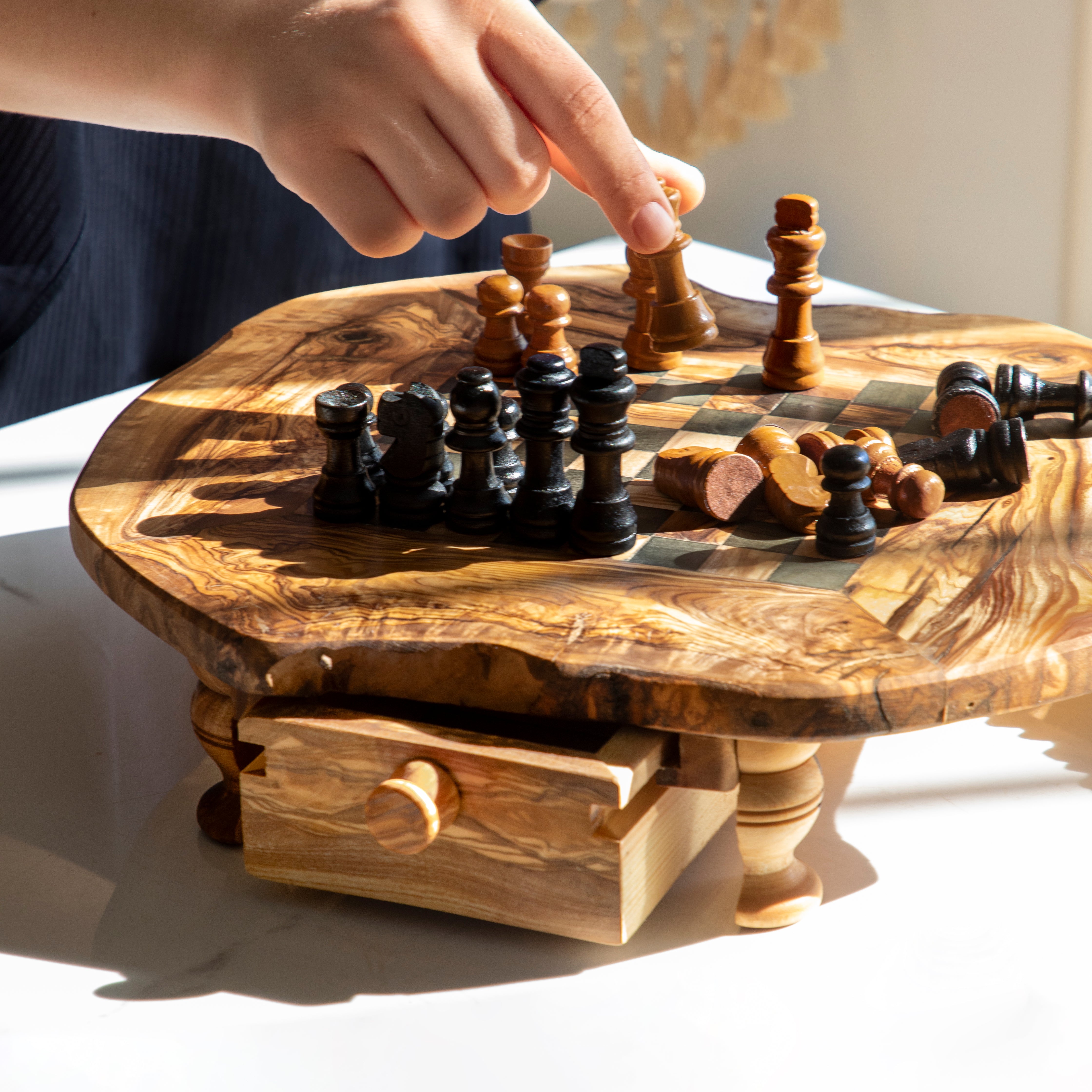 Handmade wooden chess set in olive wood with drawers and raised legs