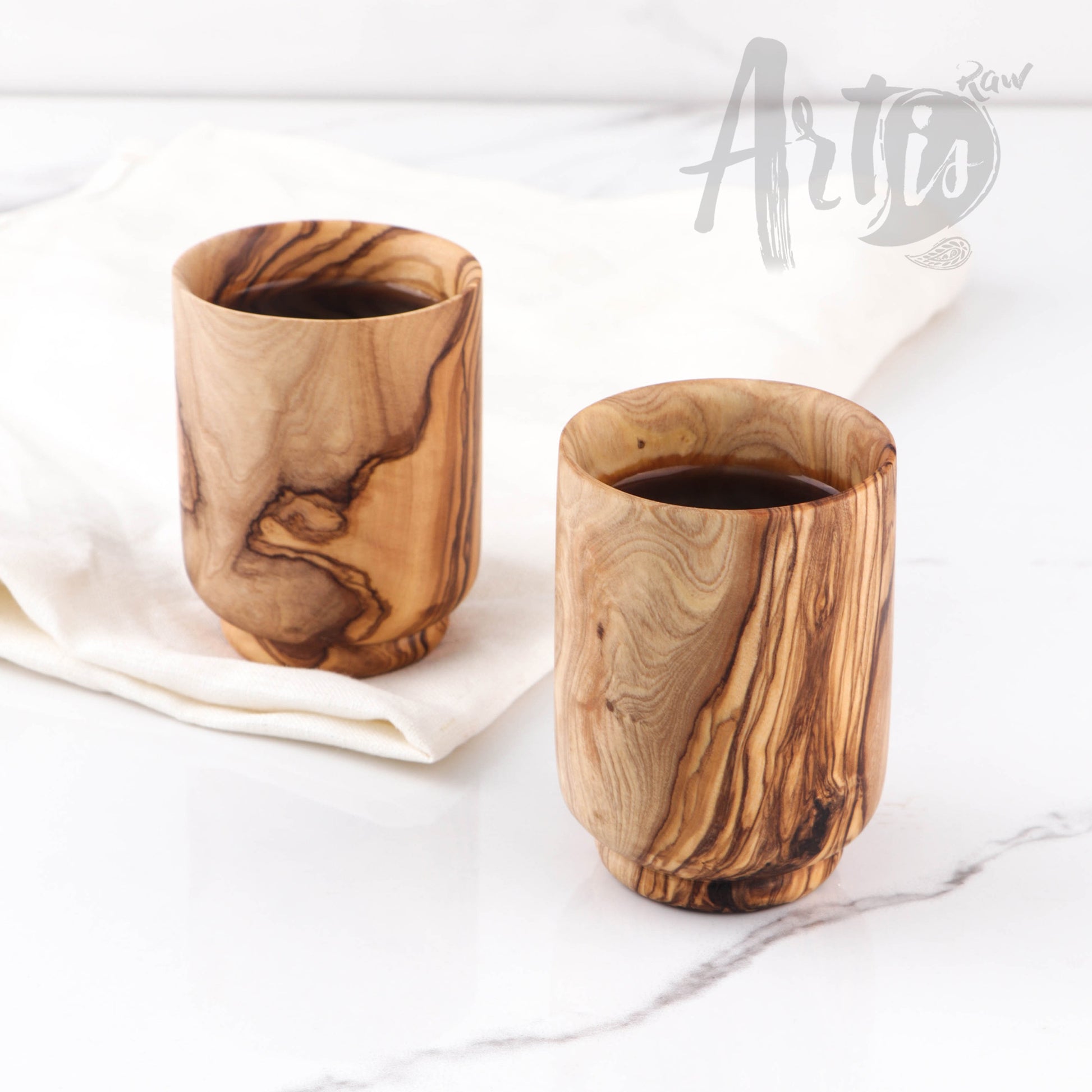 Durable Wooden Cups for All Beverages: Perfectly designed from high-quality olive wood, these cups are not only durable but also bring a piece of nature's warmth to your home. Ideal for water, juice, or any drink, blending beauty with functionality.