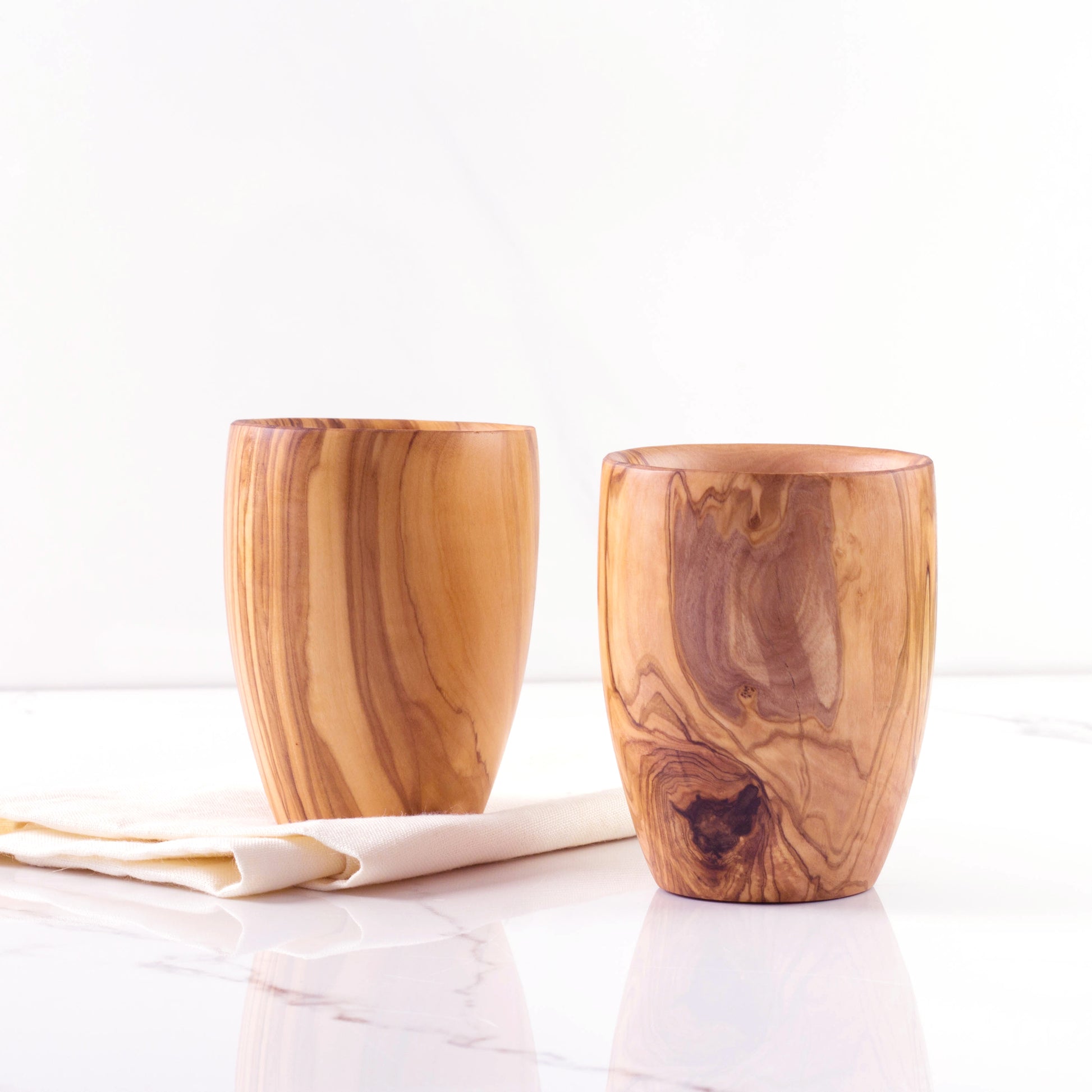 Versatile Olive Wood Drinkware: Perfect for any beverage, this large wooden cup adds a touch of natural charm to your dining experience. Enjoy a generous serving of your favorite drink in style.