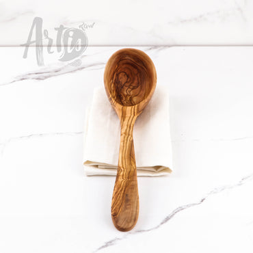 Elegant wooden soup ladle made from premium olive wood, ideal for enhancing your serving experience with a touch of natural elegance. Celebrated for its robustness and resistance to bacteria, this ladle spoon combines functionality with environmental responsibility, ensuring a long-lasting and hygienic addition to your collection of wooden utensils