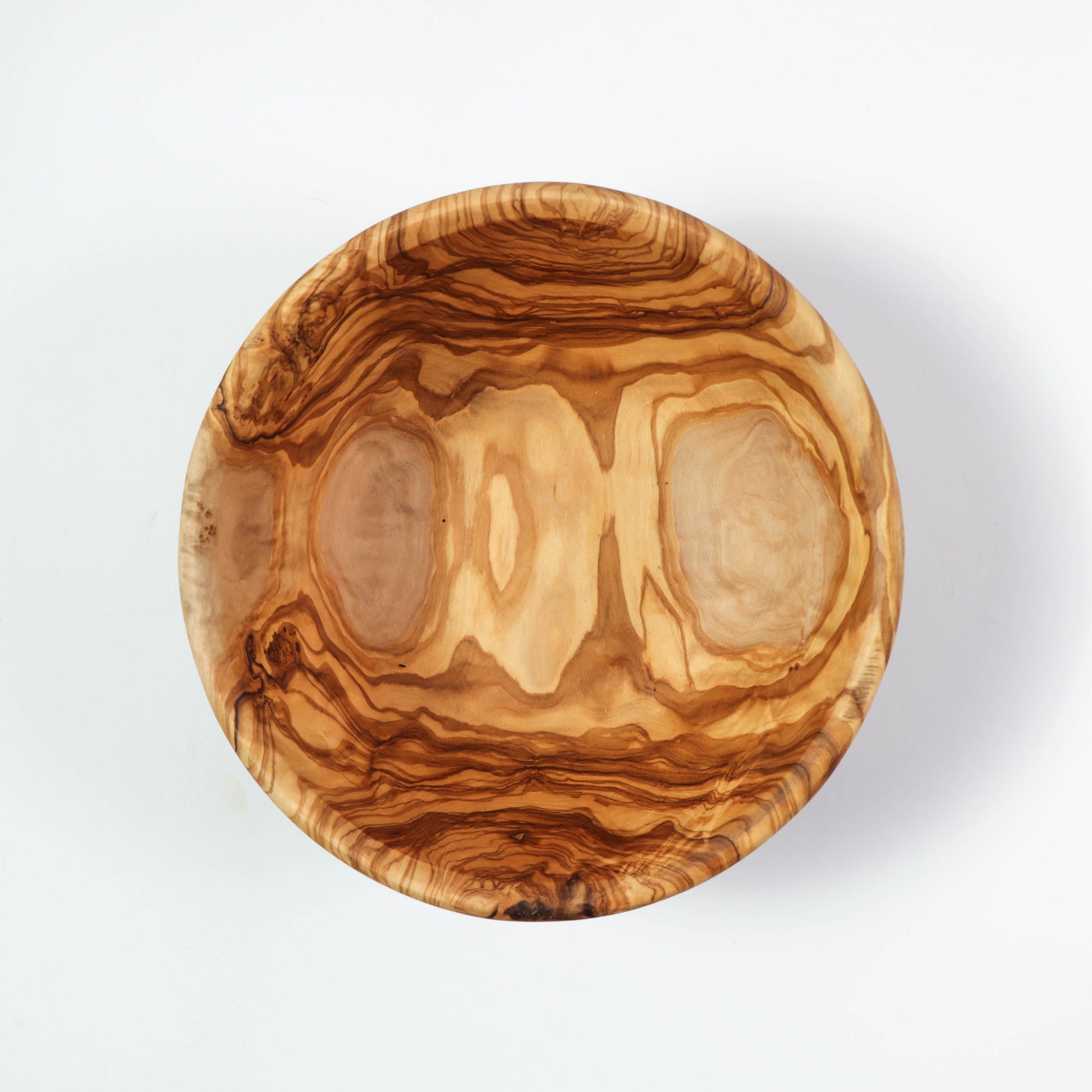 Eco-friendly Large Wooden Bowl from Olive Wood, offering a sustainable way to enjoy meals. Handmade with a smooth finish, it's a functional yet decorative centerpiece for any table setting.