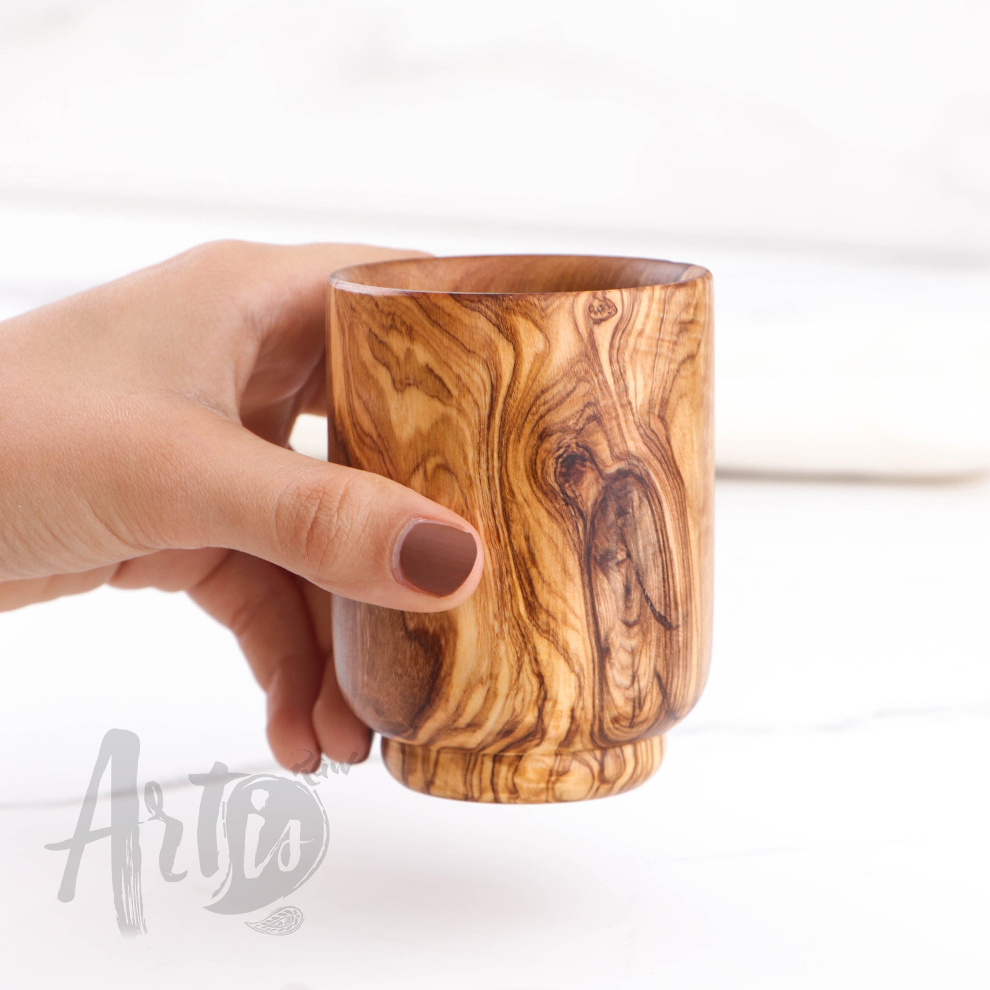 Handmade Olive Wood Drinking Cup: Experience the elegance of sipping your favorite beverages from a wooden cup, beautifully crafted for daily enjoyment. Each cup showcases olive wood's unique grain, adding natural charm to your drinkware collection