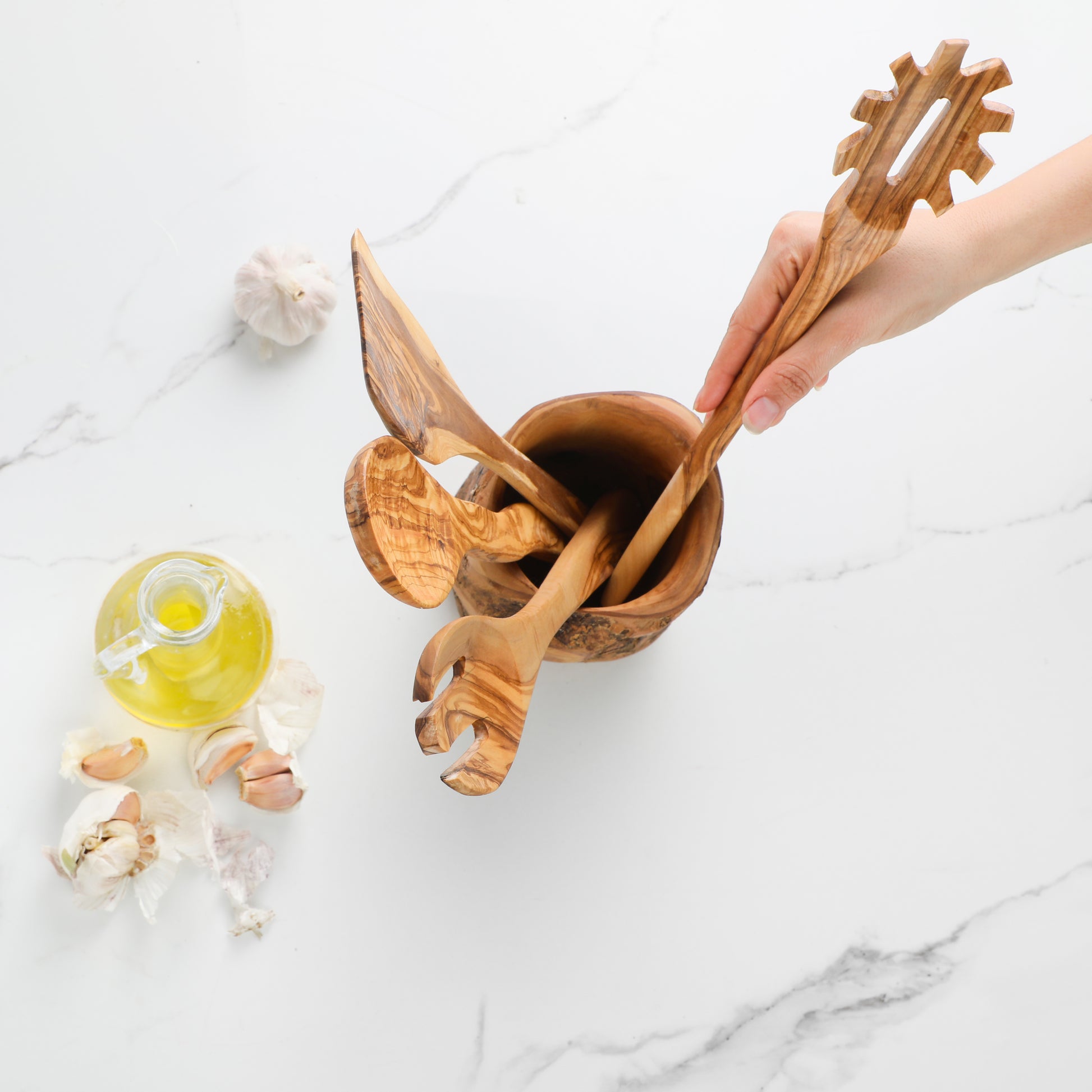 Olive wood utensil set with tree trunk holder and four cooking spoons