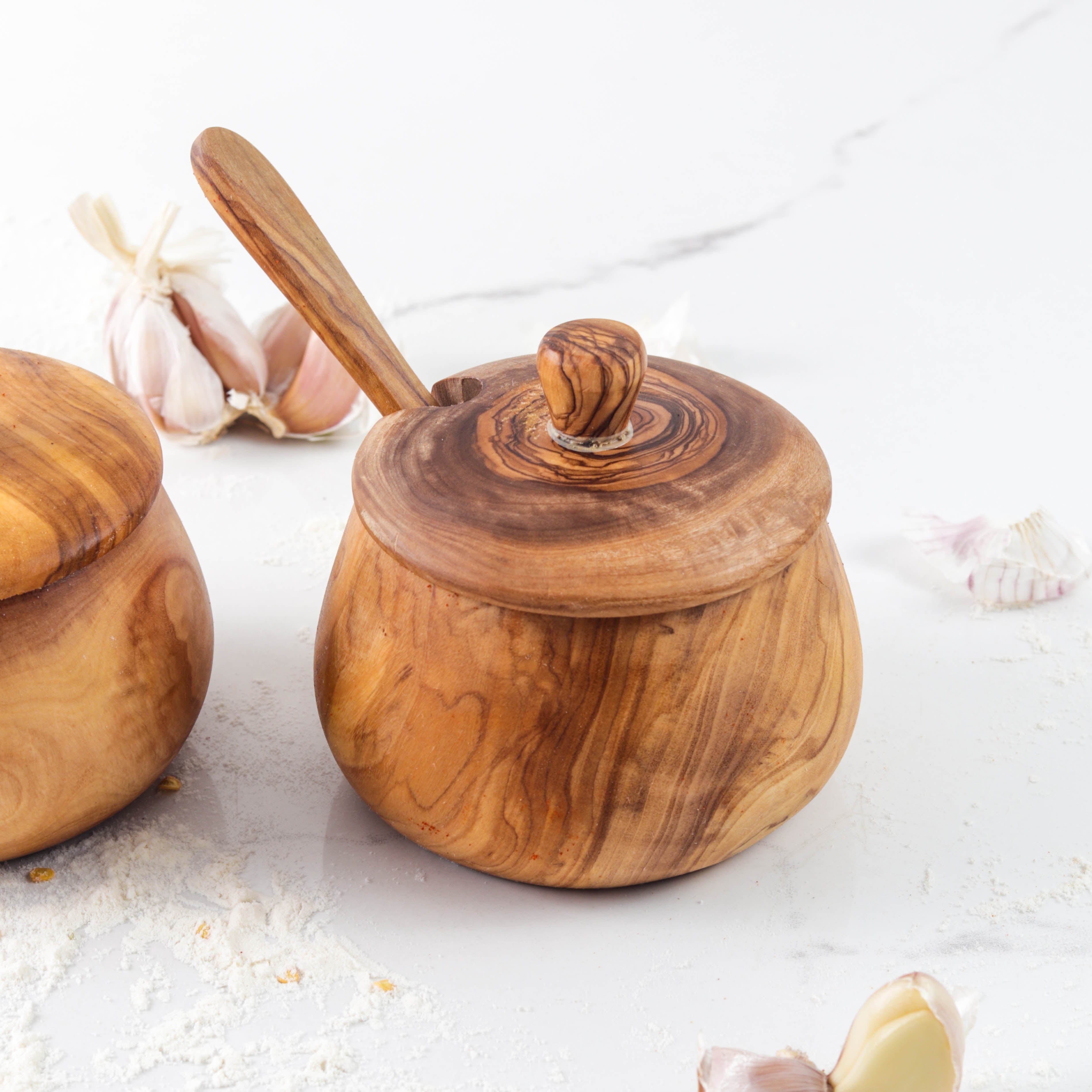 Olive wood salt cellar with removable lid and matching wooden spoon