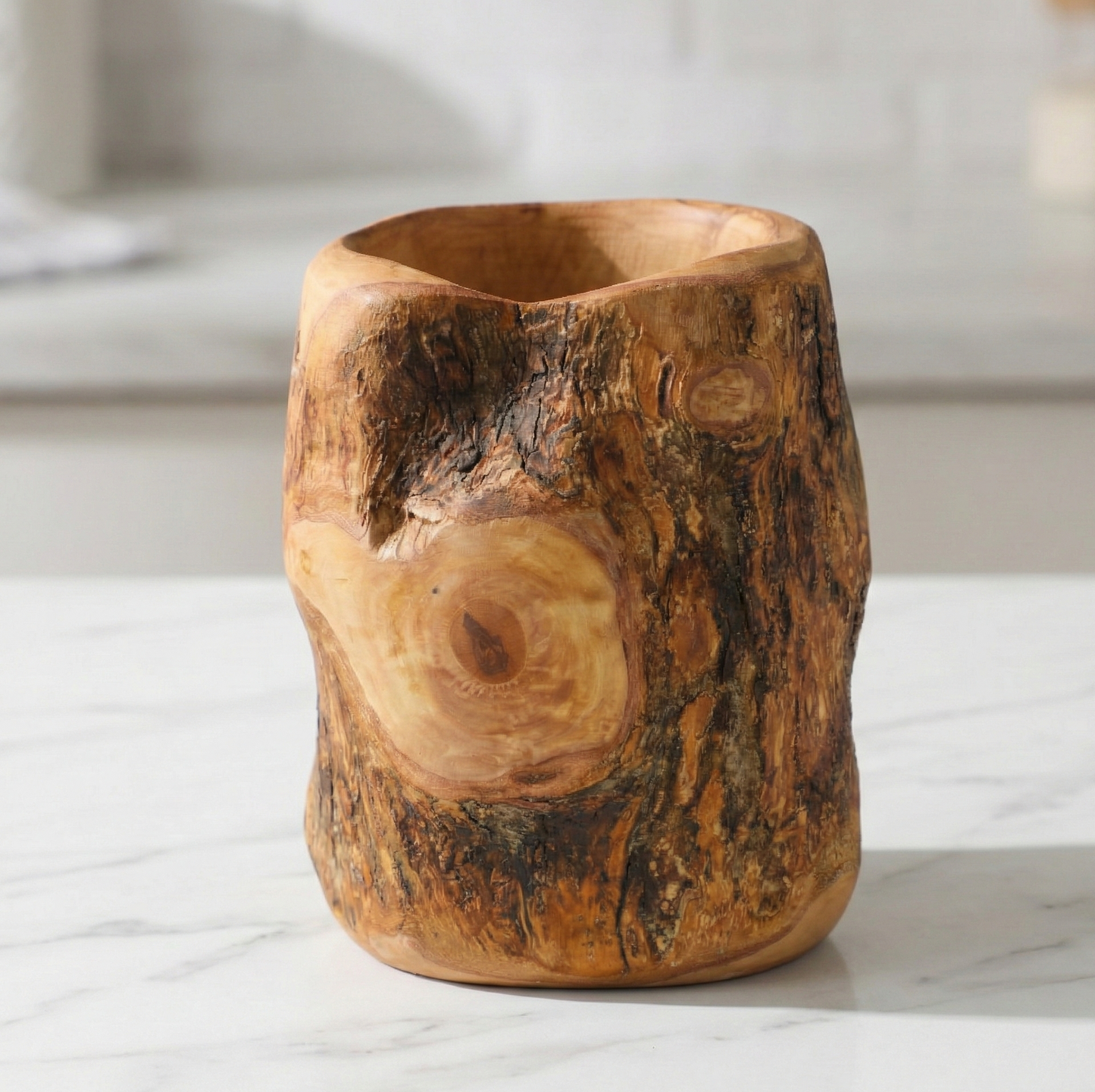 Olive wood utensil set with tree trunk holder and four cooking spoons