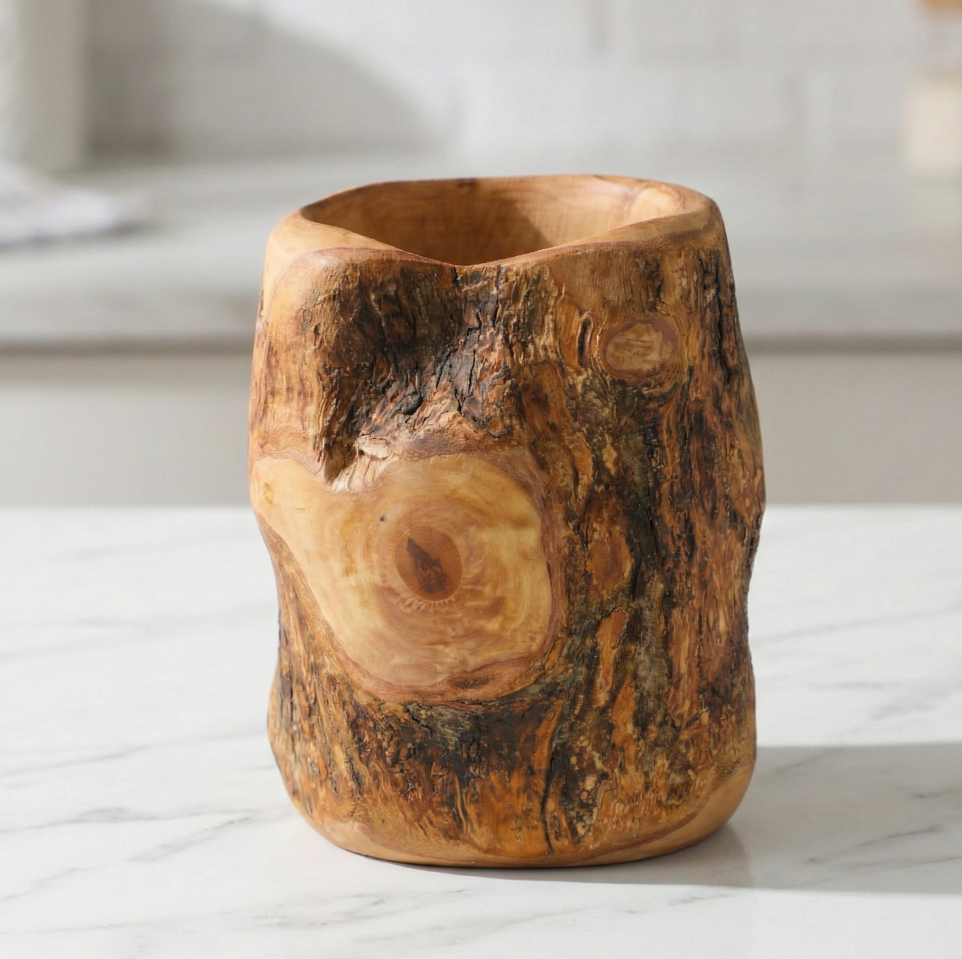 Olive wood utensil set with tree trunk holder and four cooking spoons